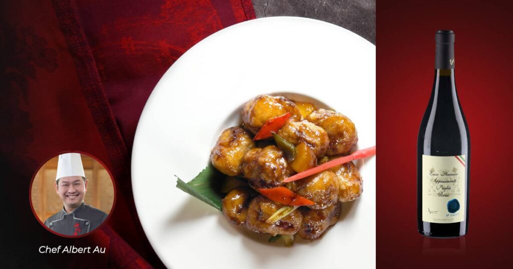 Crispy Pork Fillet Stuffed with peach tossed in black vinaigrette pineapple sauce